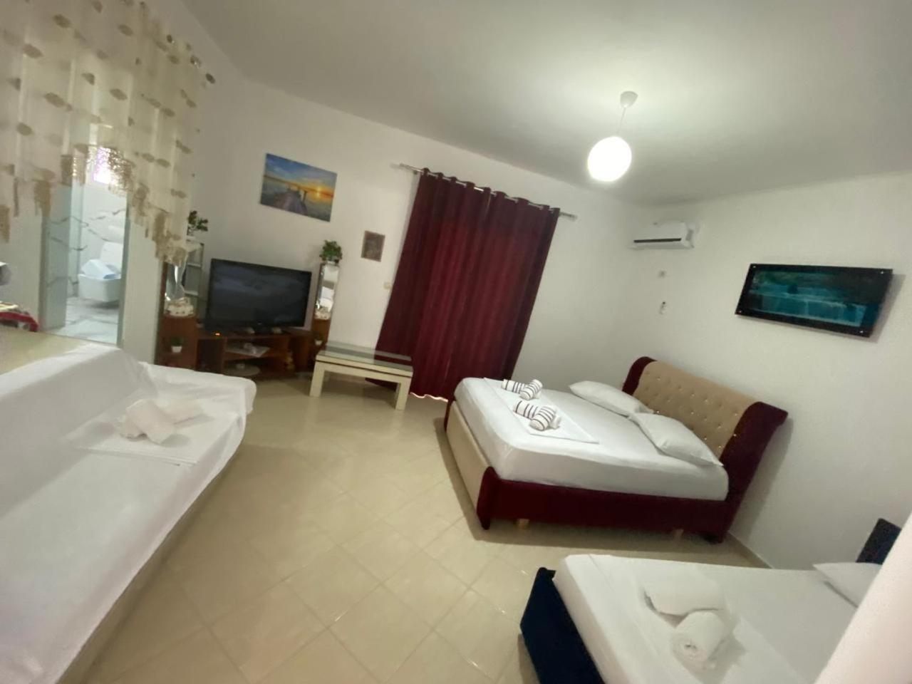 Vila Avni Likometi Ksamil Habitación foto